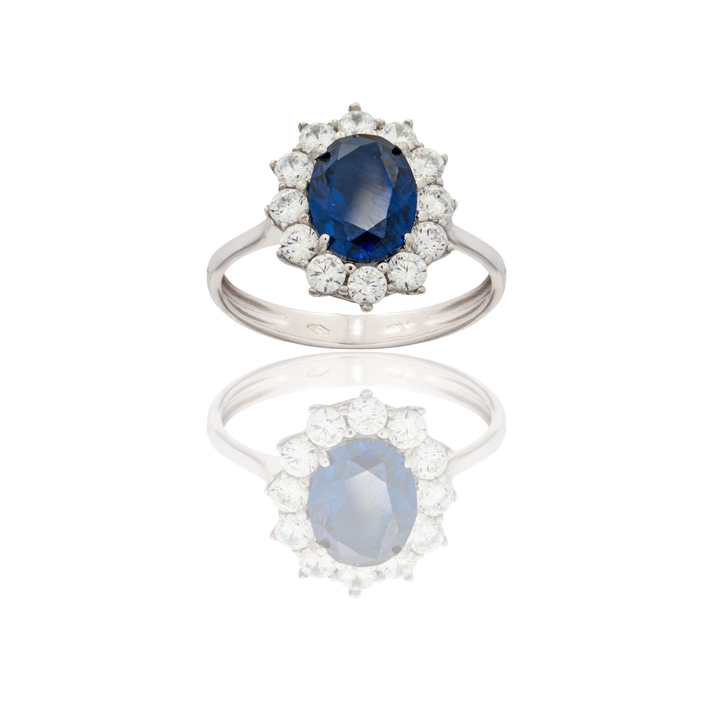 Anello Oro Bianco Oro 18 carati Modello Kate Centro E Contorno Zirconi Bianchi, Zircone Blu spessore gambo mm. 2,7 spessore pietra centrale 9 , con contorno 15