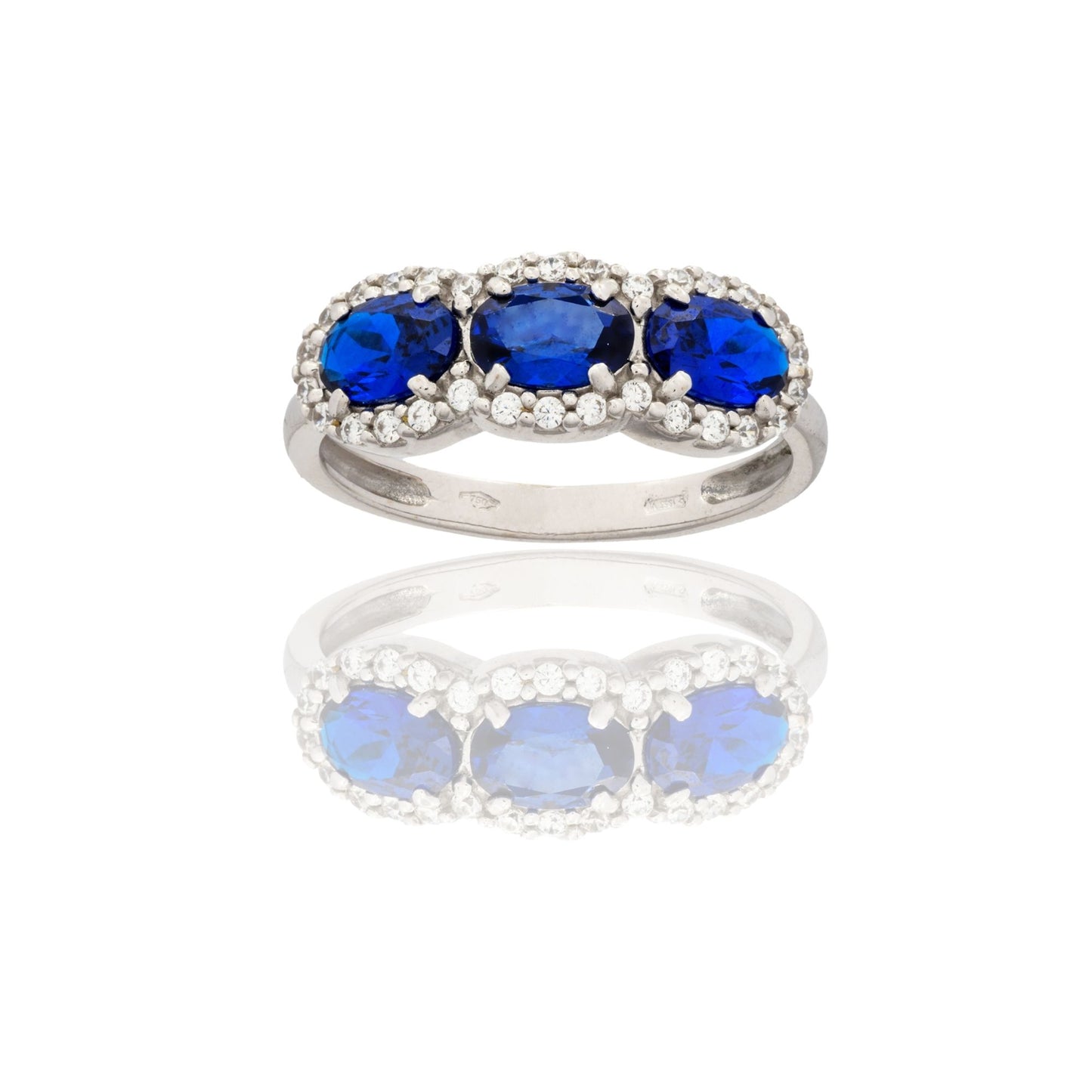Anello Oro Bianco Oro 18 carati Trilogy Con Pave' Zirconi Bianchi, Zirconi Blu spessore gambo mm. 2,3 spessore pietre 6,8