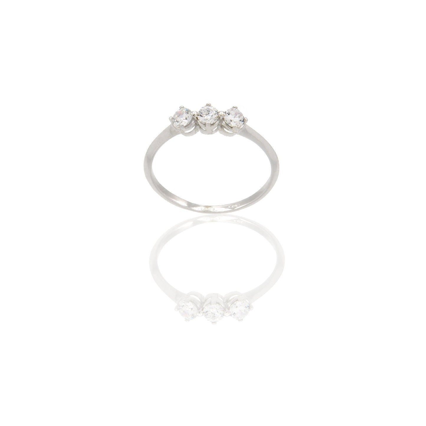 Anello Oro Bianco Oro 18 carati Trilogy 4 griffe Zirconi Bianchi spessore gambo 1,40 mm , spessore pietra 3,5