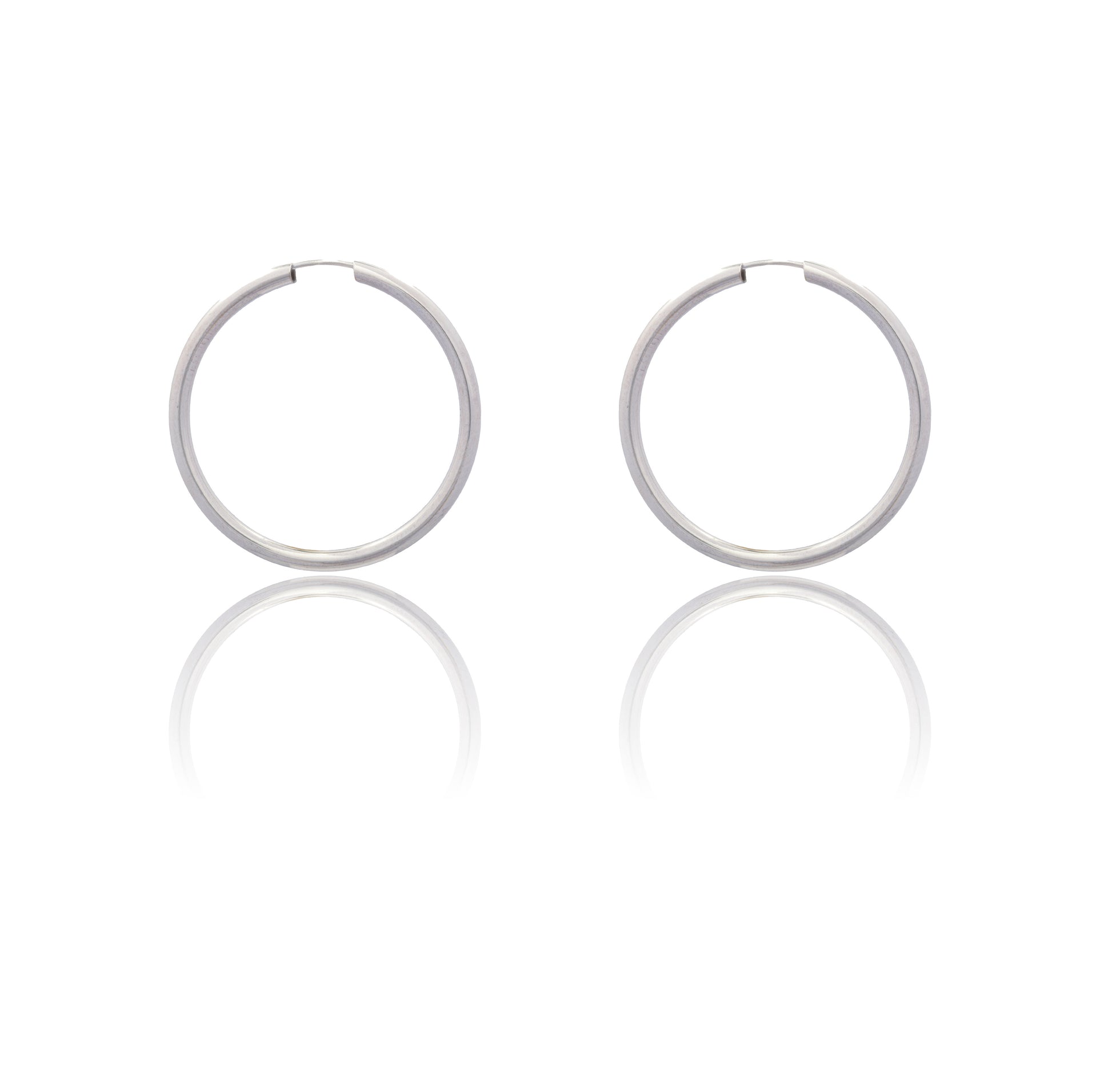 Orecchini Oro Bianco Oro 18 carati  Cerchio Chiusura A Scomparsa  Solo Oro Spessore mm 2 diametro interno cm.3