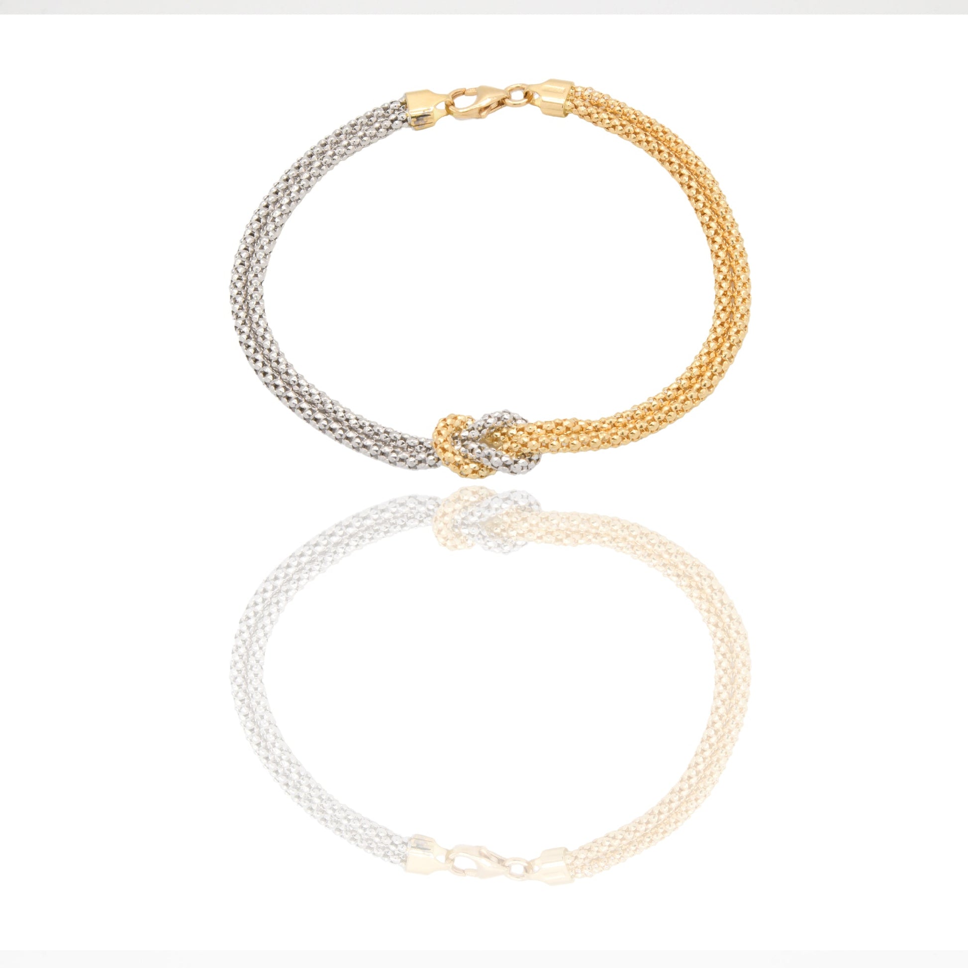 Bracciali Oro Giallo Oro Bianco Oro 18 carati Maglia con nodo centrale Solo Oro spessore catena 2,2mm spessore nodo 8,5mm lunghezza 19cm