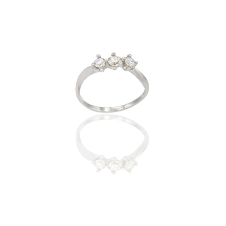 Anello Oro Bianco Oro 18 carati Trilogy 4 griffe Zirconi Bianchi spessore gambo 1,40 mm , spessore pietra 5