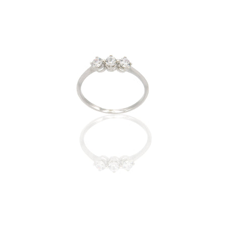 Anello Oro Bianco Oro 18 carati Trilogy 4 griffe Zirconi Bianchi spessore gambo 1,40 mm , spessore pietra 3,5